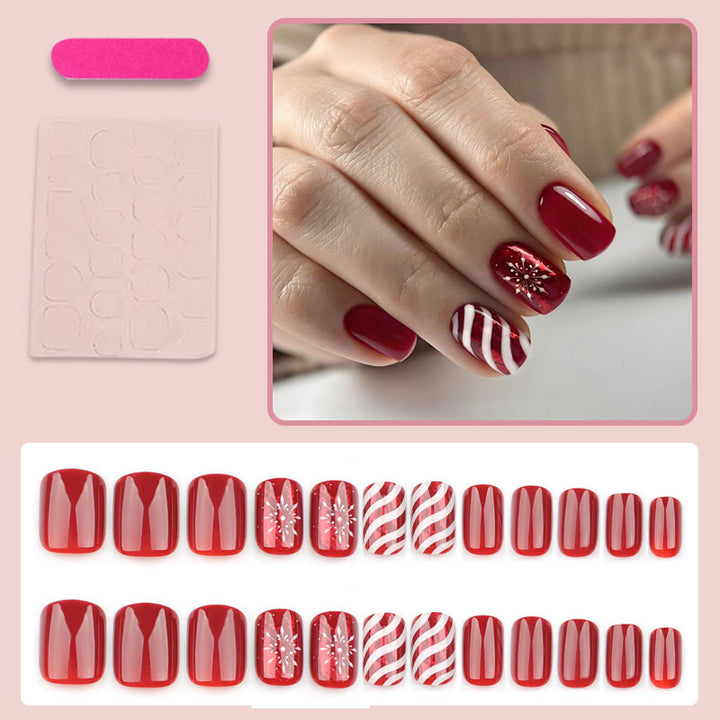 Artificial nail set with festive winter motifs and glitter accents Stornfield