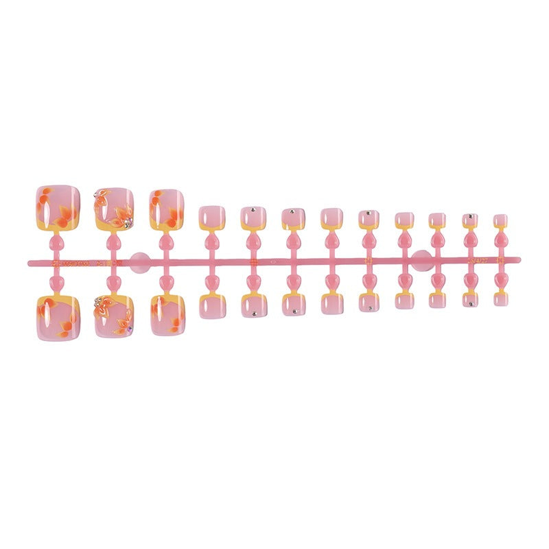 Artificial nail set with floral design and glitter accents Stornfield