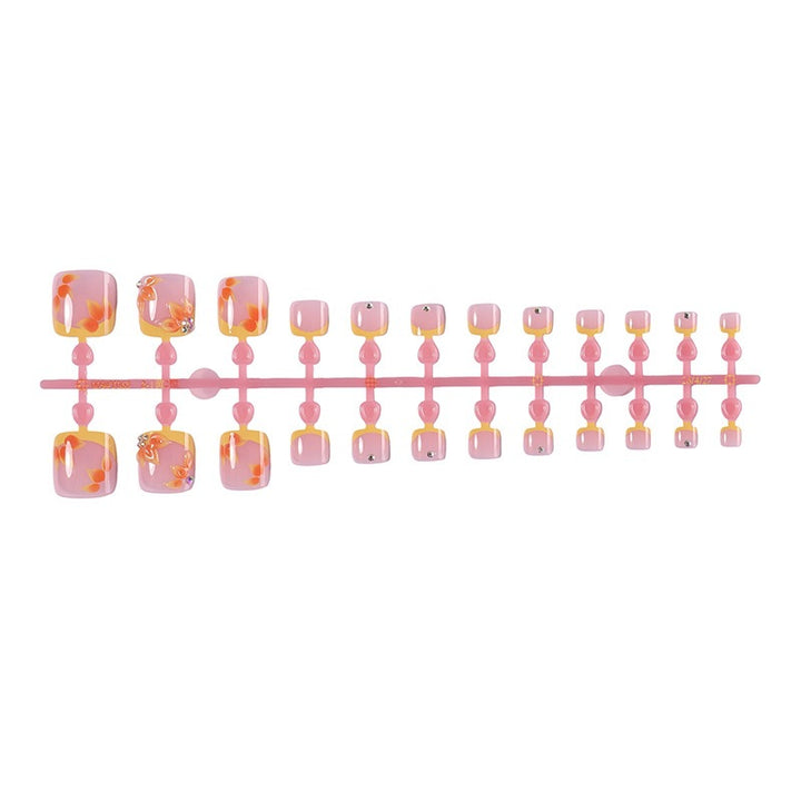 Artificial nail set with floral design and glitter accents Stornfield