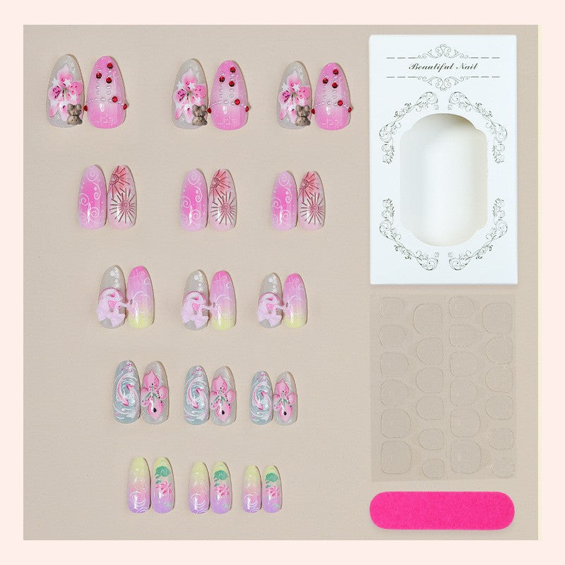 Creative nail art set with floral and playful designs Stornfield