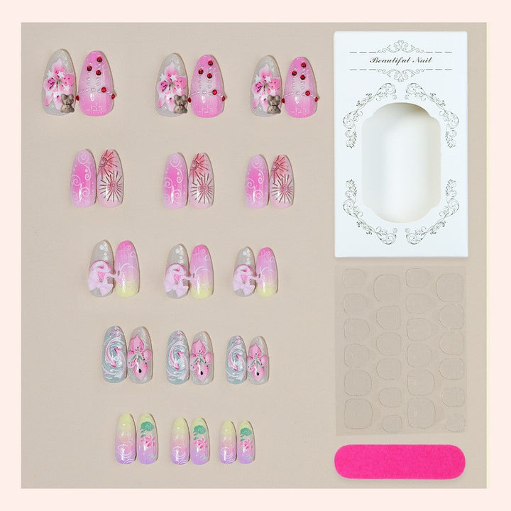 Creative nail art set with floral and playful designs Stornfield