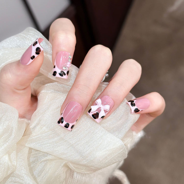 Decorative Press-On Nail Set with Unique Bow and Gem Accents