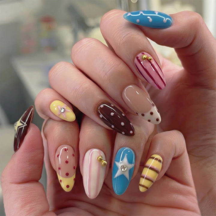 Creative artificial nails with playful patterns Stornfield