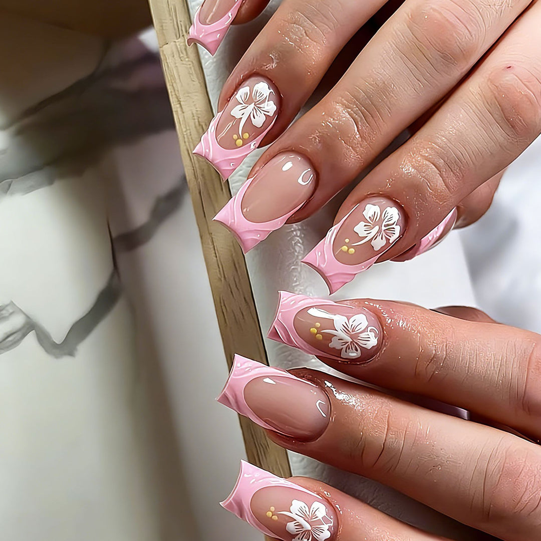 Artificial nails with floral designs and elegant shape Stornfield