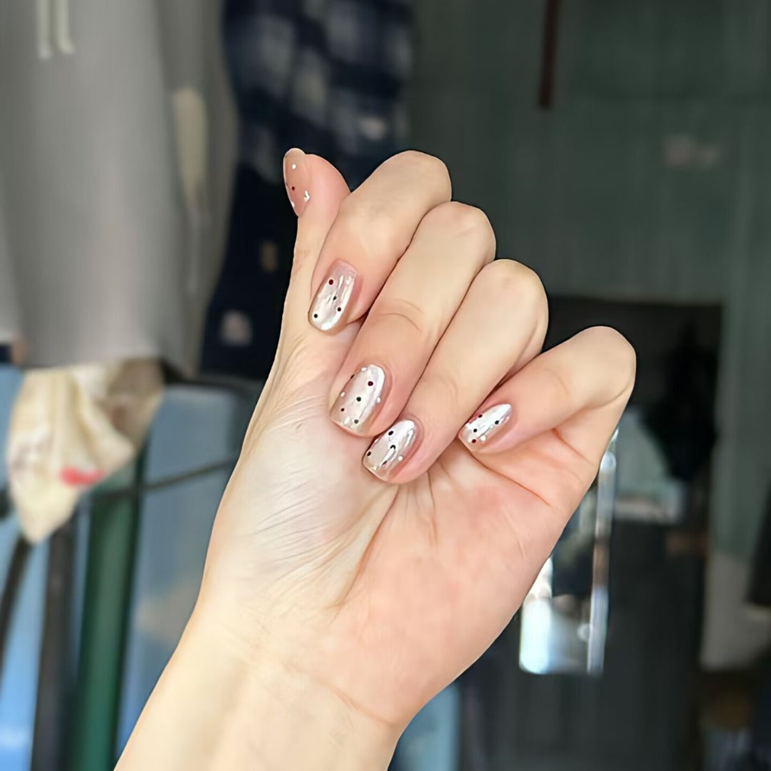 Trendy artificial nails with glitter effects Stornfield