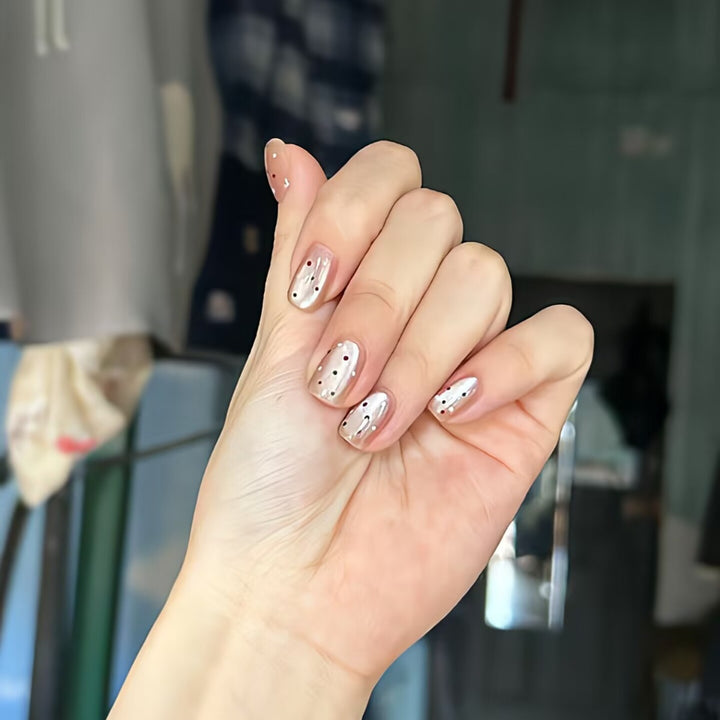 Trendy artificial nails with glitter effects Stornfield