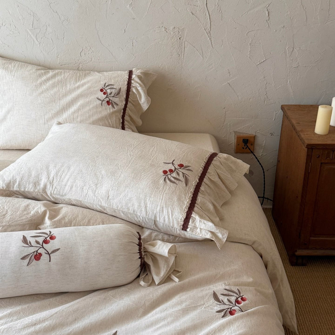 Linen bedding set with cherry embroidery and ruffles