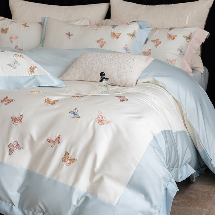 Luxurious cotton satin bedding set with embroidered butterfly appliqués