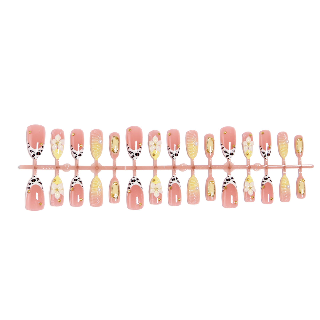 Artificial nails with floral patterns and golden accents Stornfield