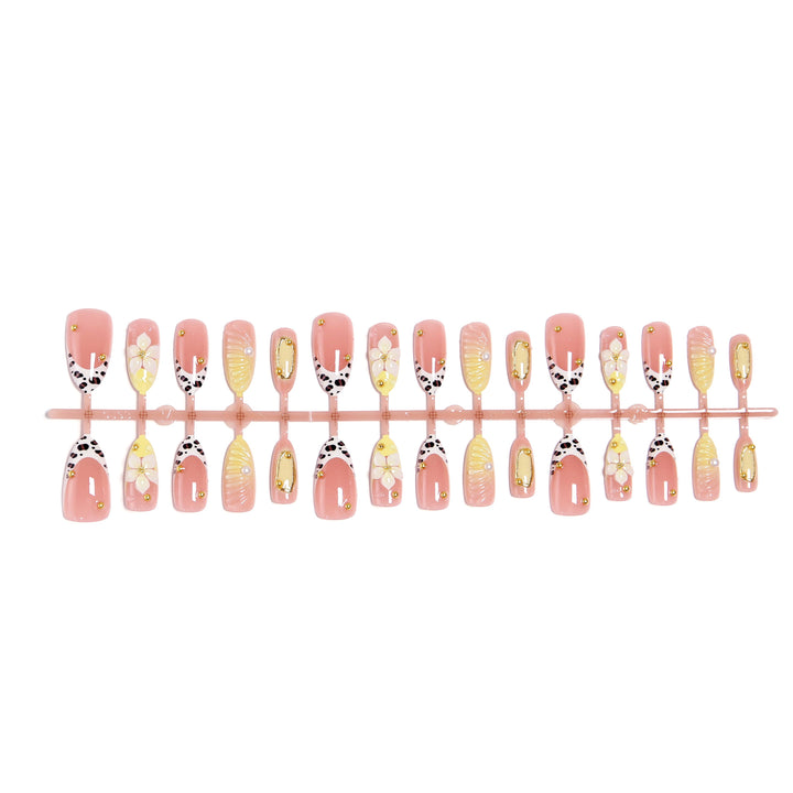 Artificial nails with floral patterns and golden accents Stornfield