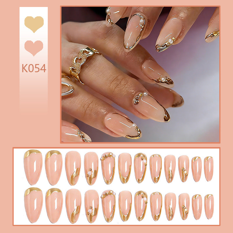 Elegant artificial nails with golden accents Stornfield