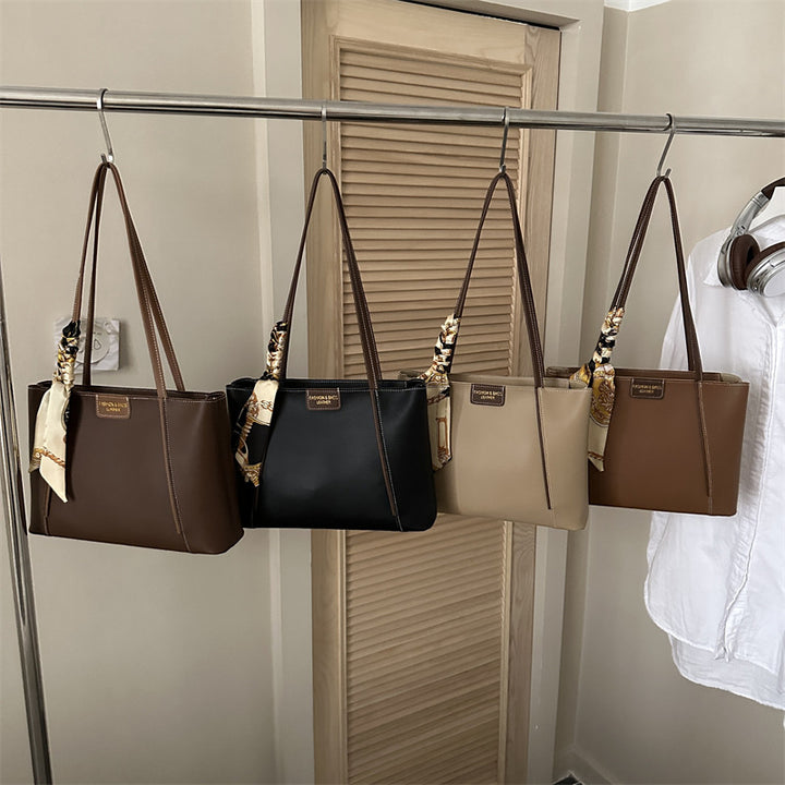 Elegant Leather Tote Bag with Decorative Scarf
