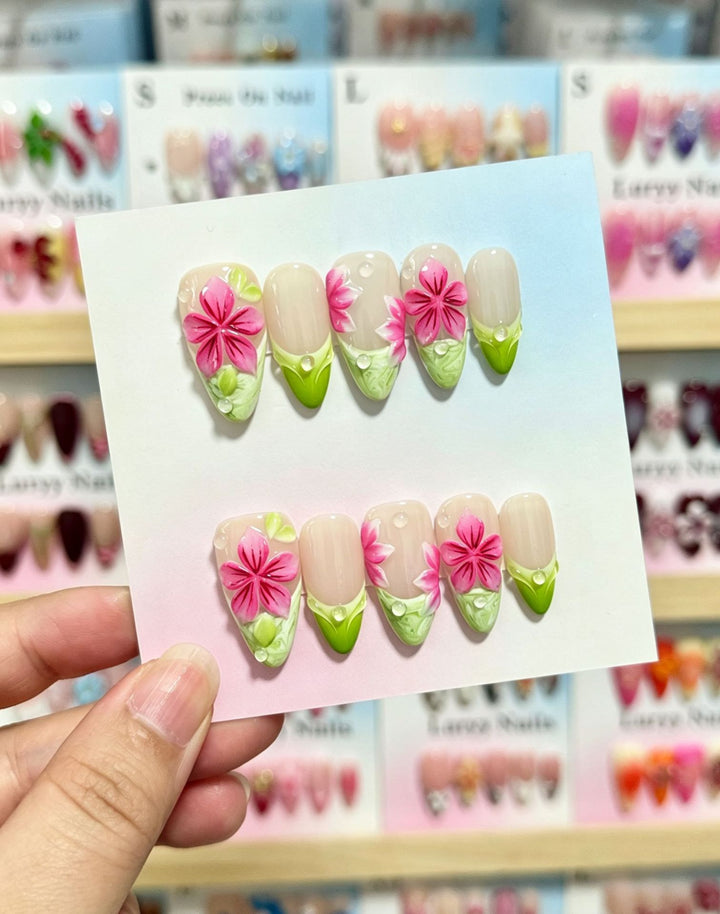 Artistic Press-On Nail Set with Floral and Green Accents