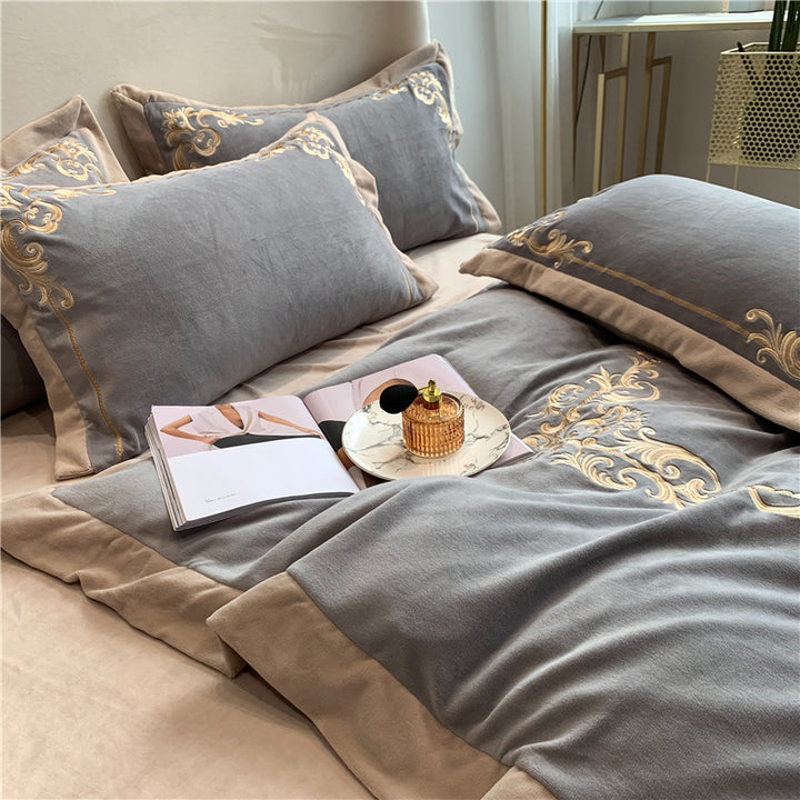 Elegant bed set made of cotton satin with baroque embroidery border and reversible blanket