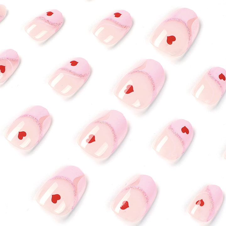 Artistic Nail Extensions with Heart Motif Stornfield