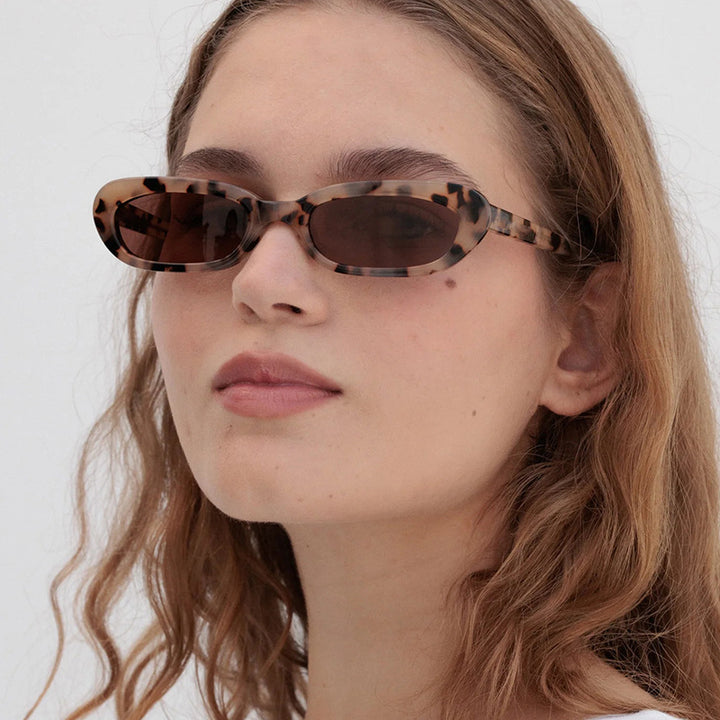 Women's trendy cat-eye sunglasses with transparent plastic frame and UV protection Stornfield