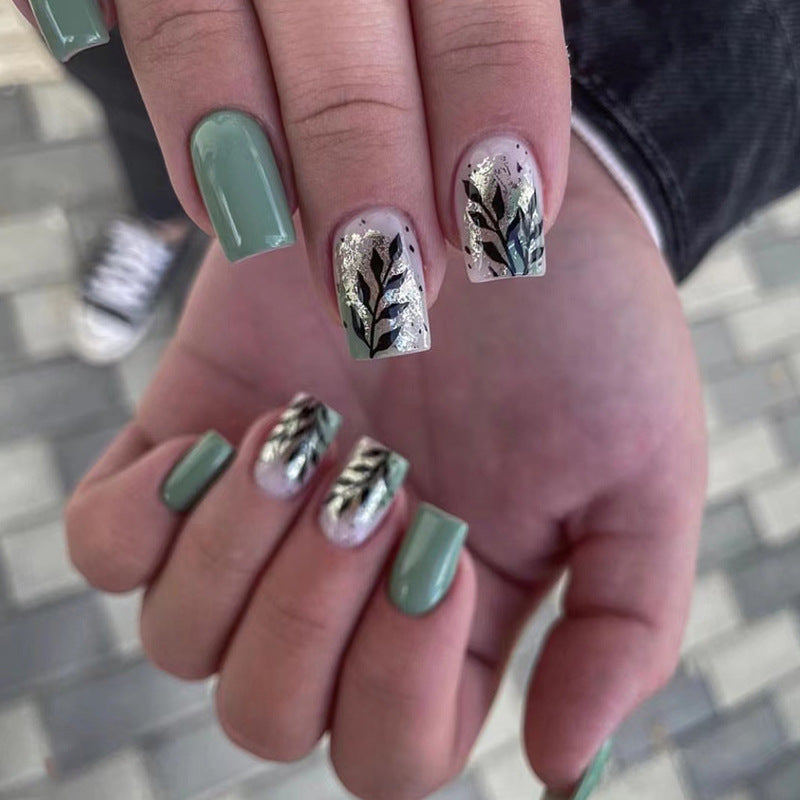 Artful Nail Extensions with Elegant Leaf Design Stornfield