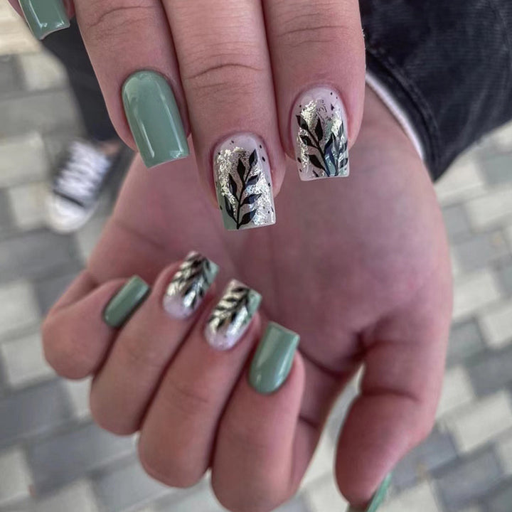 Artful Nail Extensions with Elegant Leaf Design Stornfield