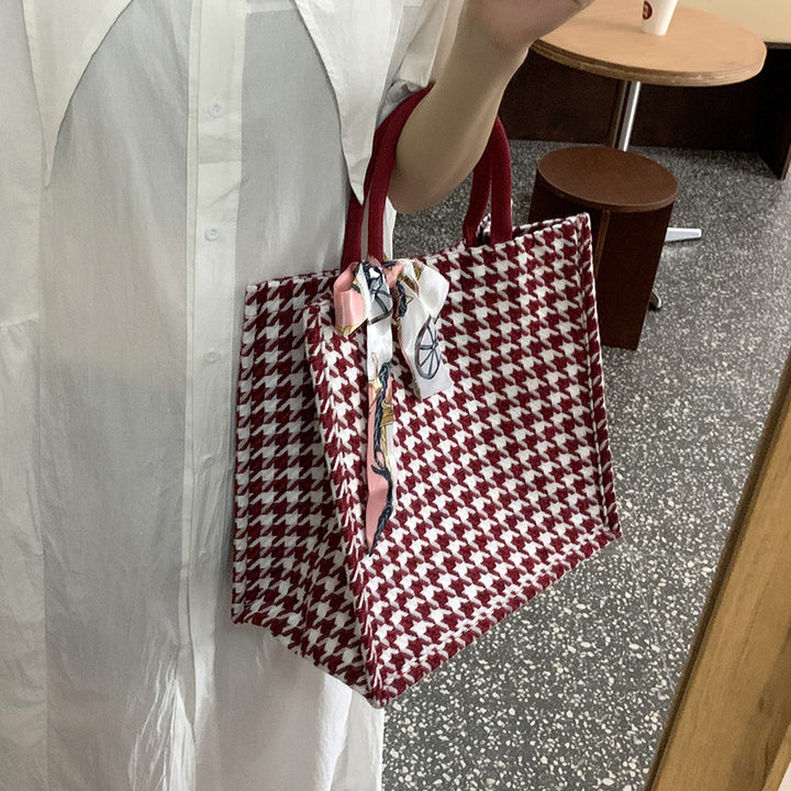 Elegant Houndstooth Handbag with Decorative Bow