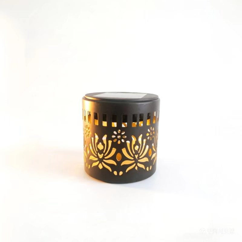 Decorative Solar-Powered Metal Lantern With Geometric Cutout And Warm LED Candle Effect Stornfield