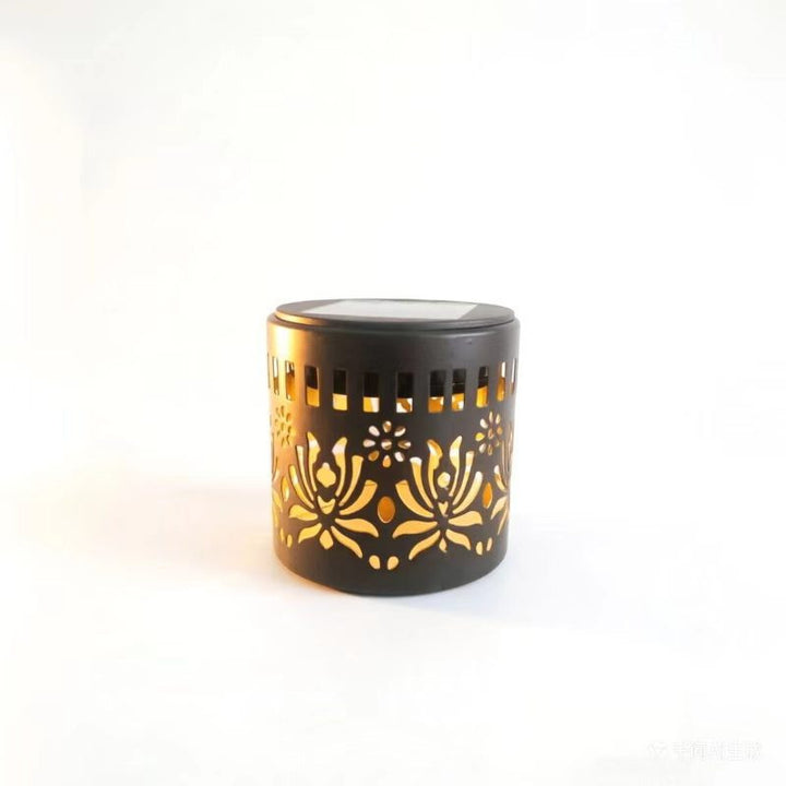 Decorative Solar-Powered Metal Lantern With Geometric Cutout And Warm LED Candle Effect Stornfield
