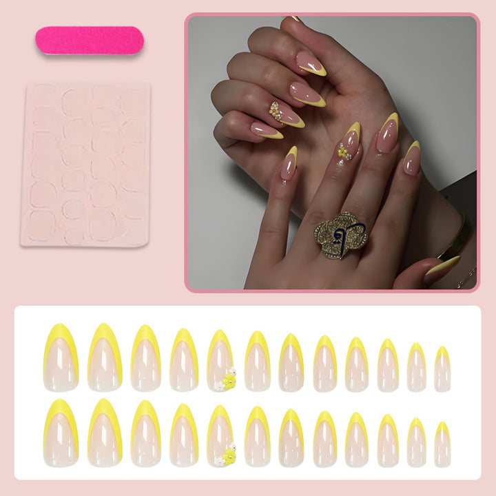 Artificial nail set with elegant gradient and floral accents Stornfield