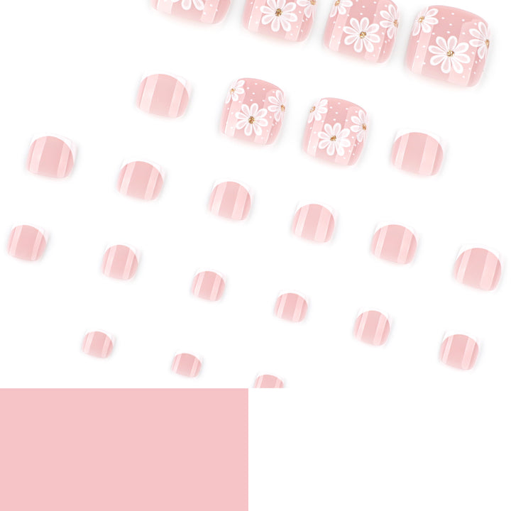 Artistic toenail art with elegant daisy motifs Stornfield