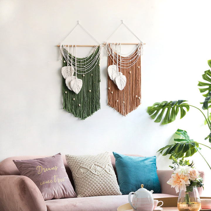 Artistic wall hanging made of macrame with hearts