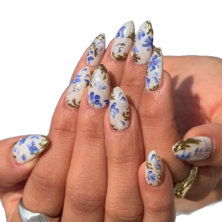 Artificial nails with exquisite floral and gold accents Stornfield