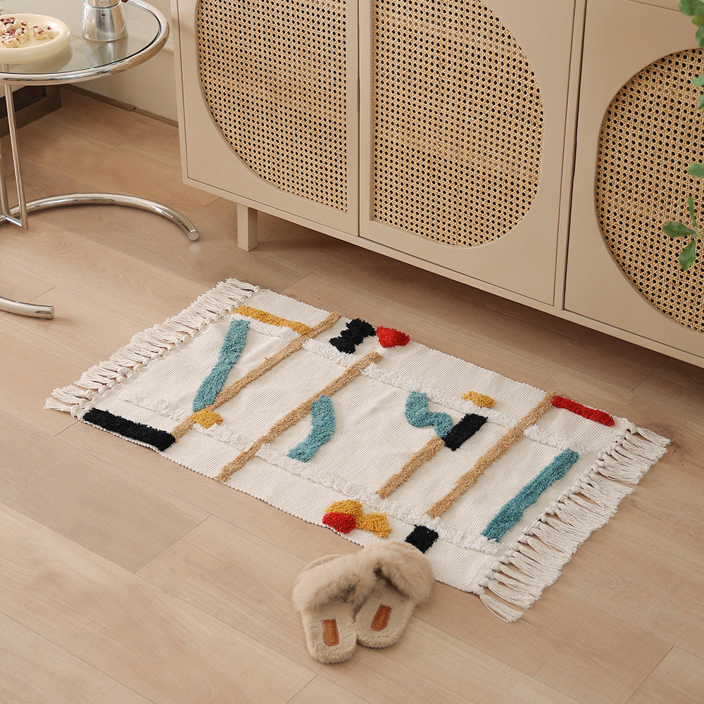 handwoven cotton runner with fringe and embossed relief pattern