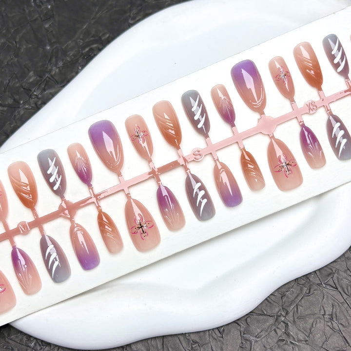 Artistic Press-On Nail Art Set with Floral and Gem Details