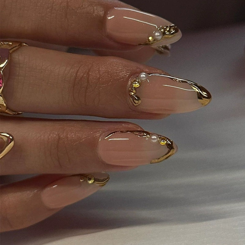 Decorative Gold-Accented Acrylic Nail Art Stornfield