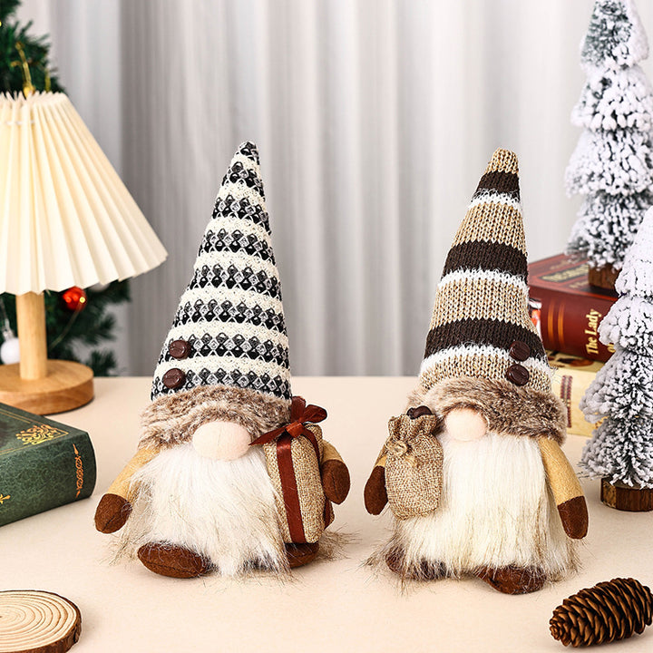 Decorative Christmas gnome with gift package Stornfield