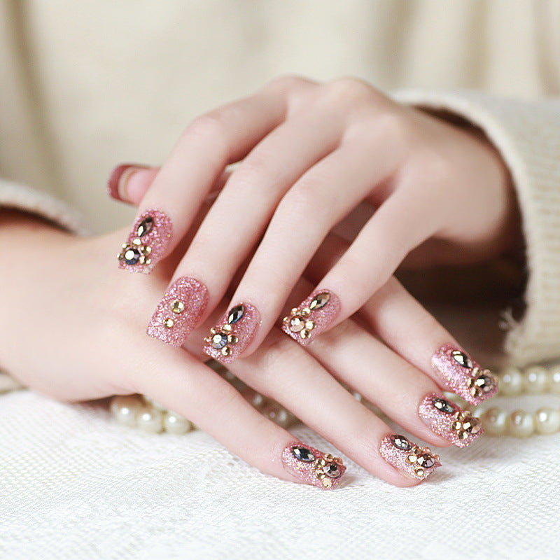 Artificial nails with elegant flower and rhinestone design Stornfield