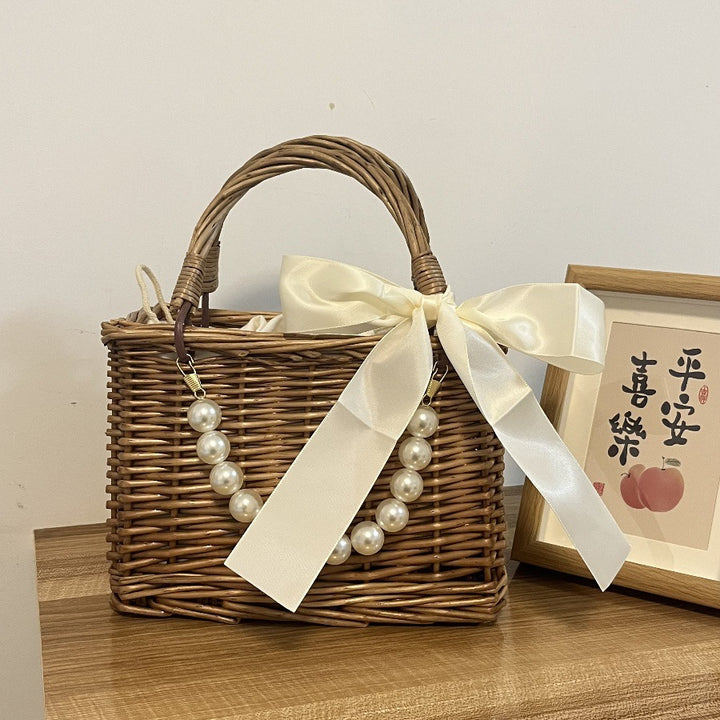 Ladies' basket bag with decorative pearl accents and bow decoration Stornfield