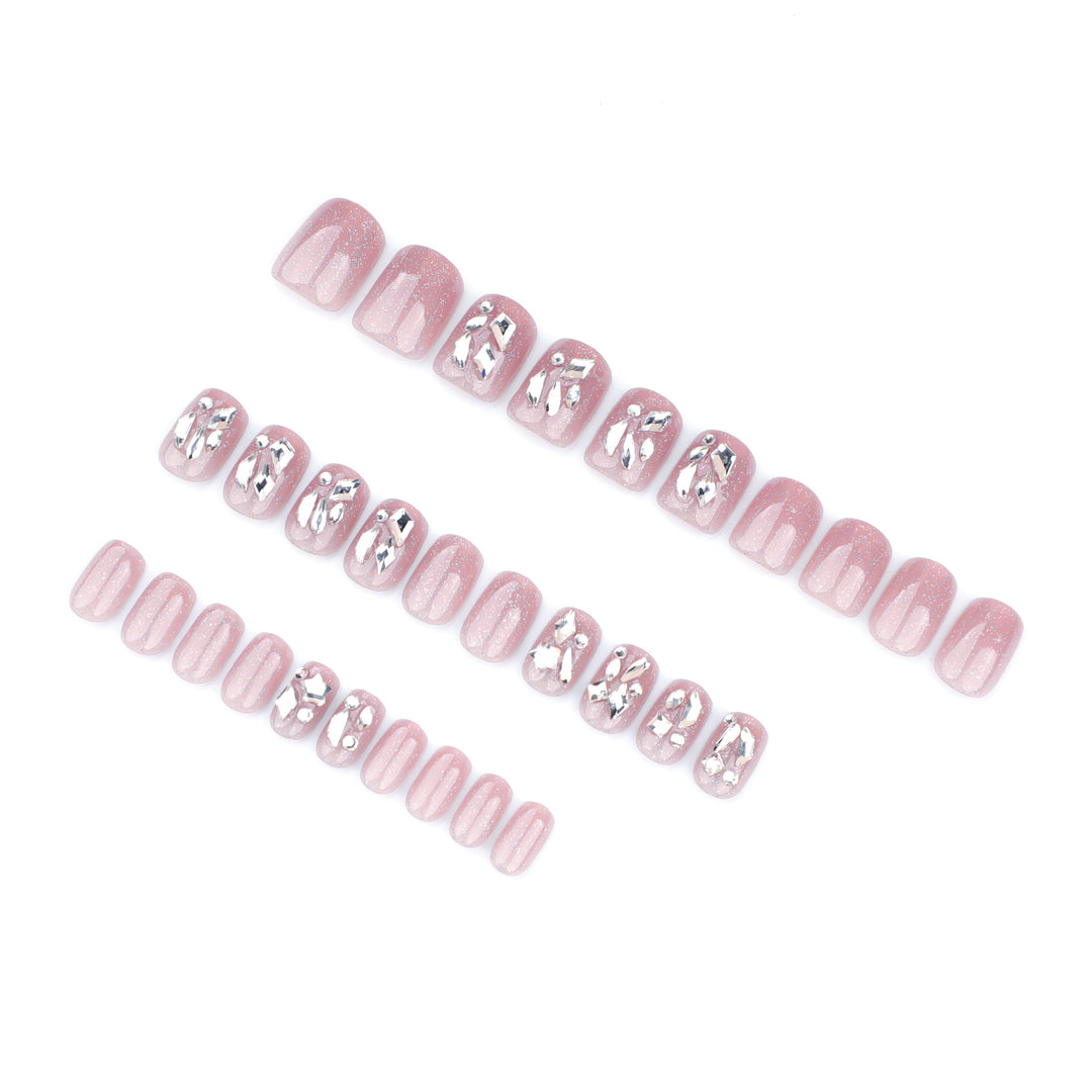 Artificial nail art with glamorous glitter accents Stornfield
