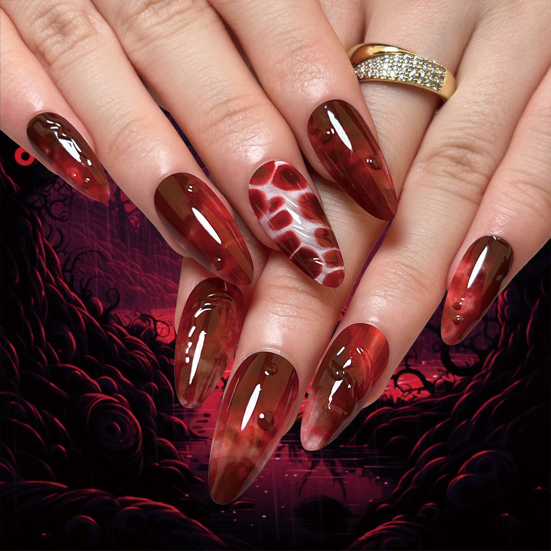 Creative Stiletto Nail Art with Blood Red Accents Stornfield