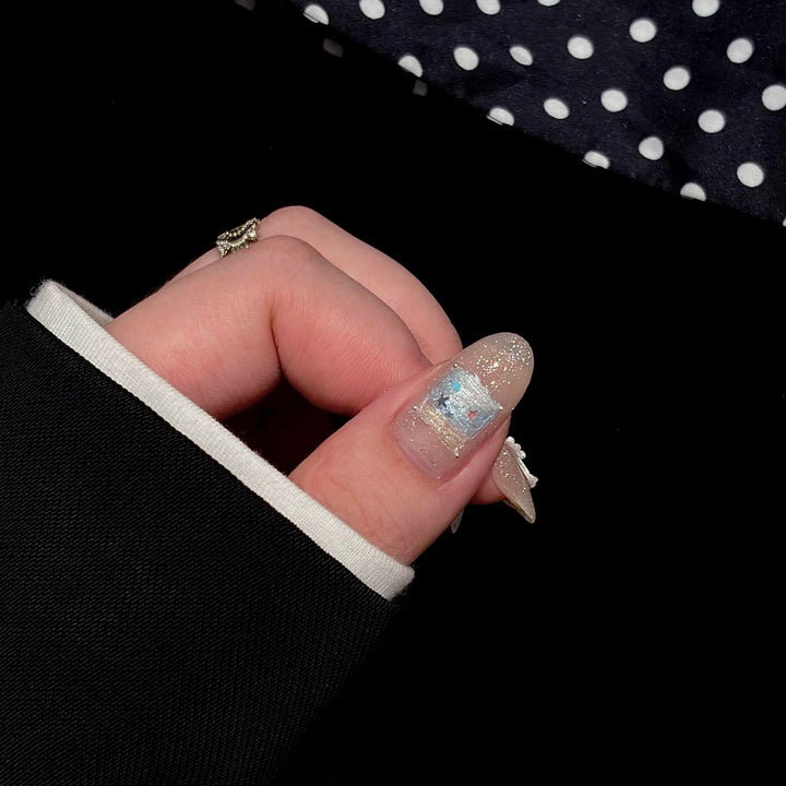 Acrylic Nail Set with Dreamy Glitter and Pearl Designs Stornfield