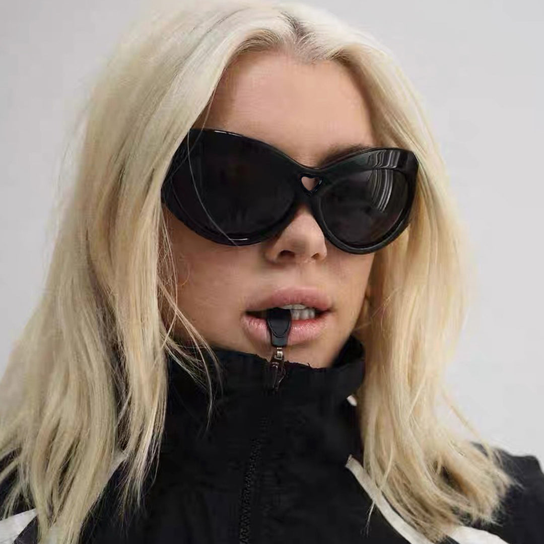 Women striking sunglasses in trendy leopard pattern Stornfield
