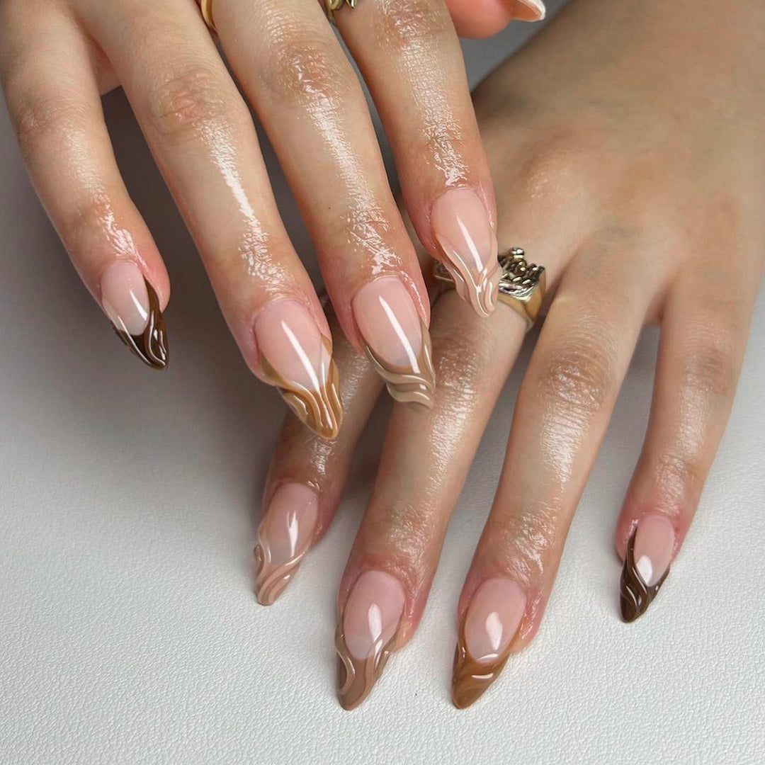 Artful stiletto nails with elegant gradient and glitter accents Stornfield