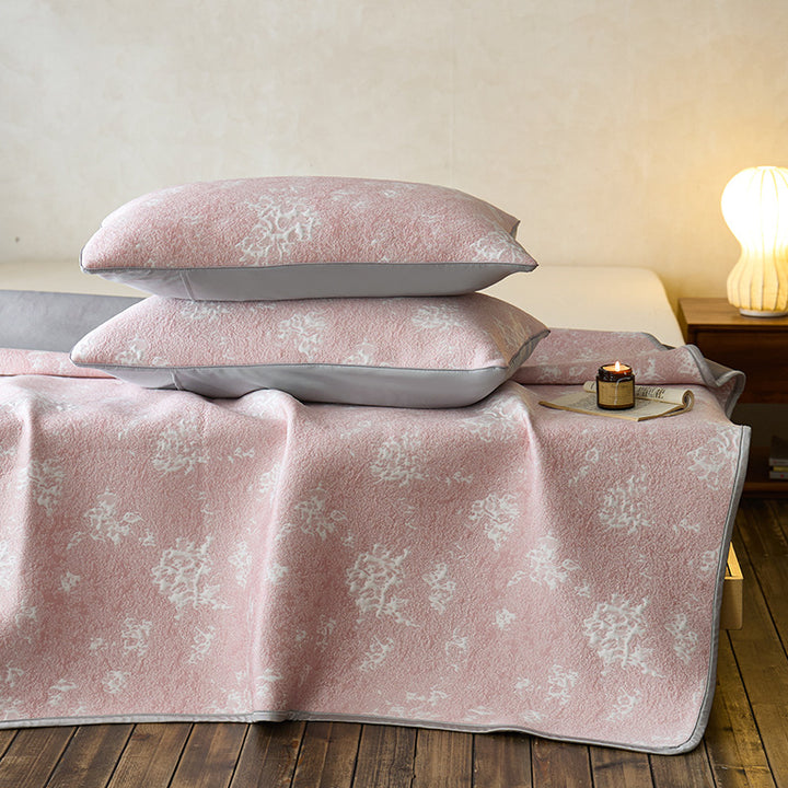 Quilted microfiber mattress pad with non-slip bottom and floral jacquard surface