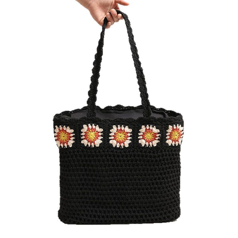 Hand-crocheted beach bag with floral accents Stornfield
