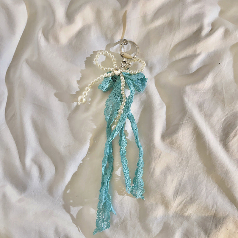 Elegant Pearl Embellished Charm Keychain Stornfield
