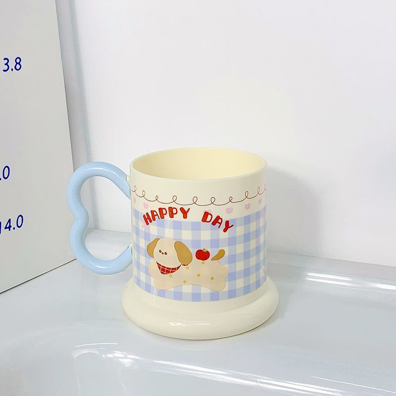 Ceramic mug with playful puppy motif Stornfield