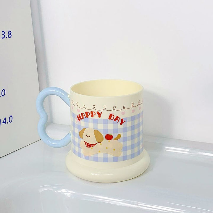 Ceramic mug with playful puppy motif Stornfield