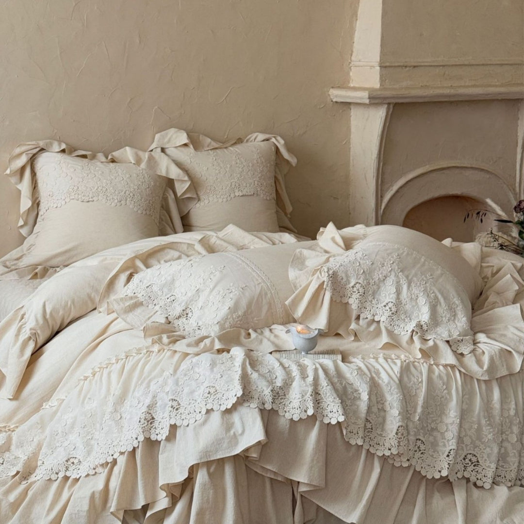 Vintage-inspired duvet cover set with layered ruffles and lace appliqué