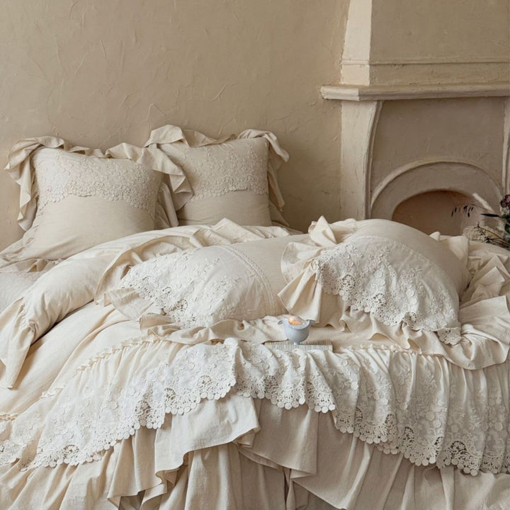 Vintage-inspired duvet cover set with layered ruffles and lace appliqué