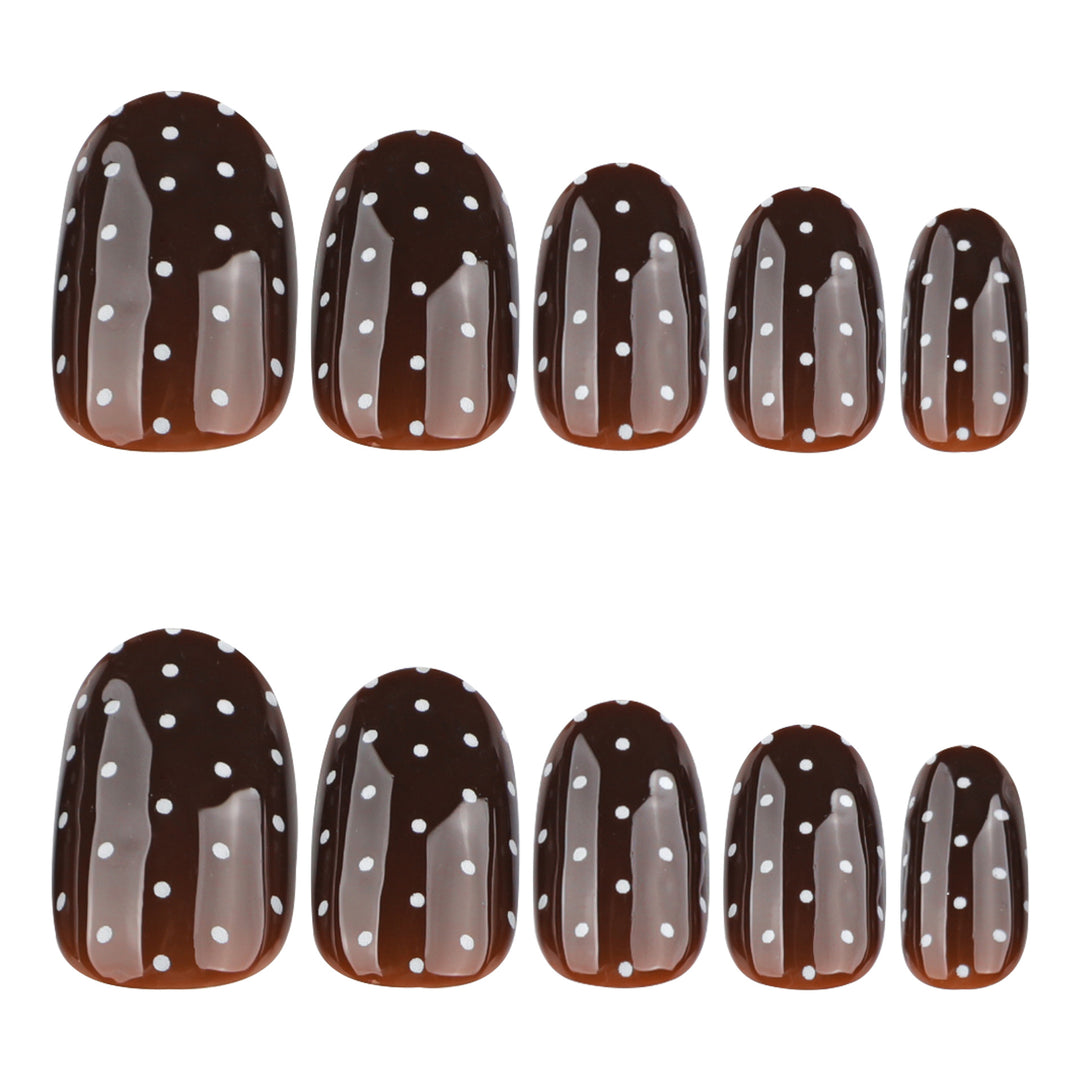 Elegant and modern nail art with polka dots Stornfield