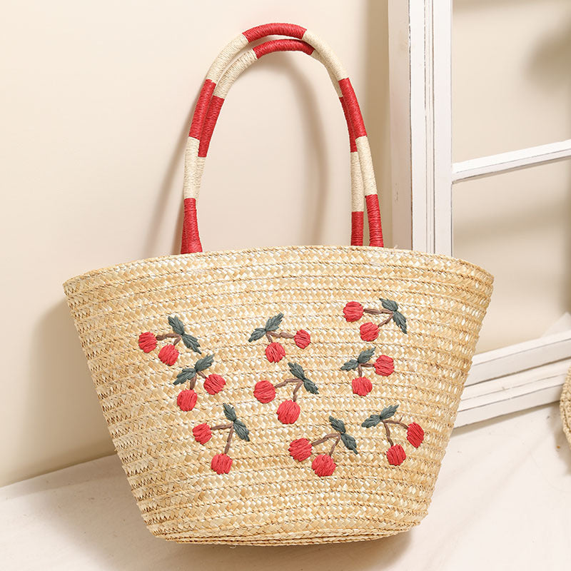 Handcrafted basket bag with vibrant floral embroidery design Stornfield