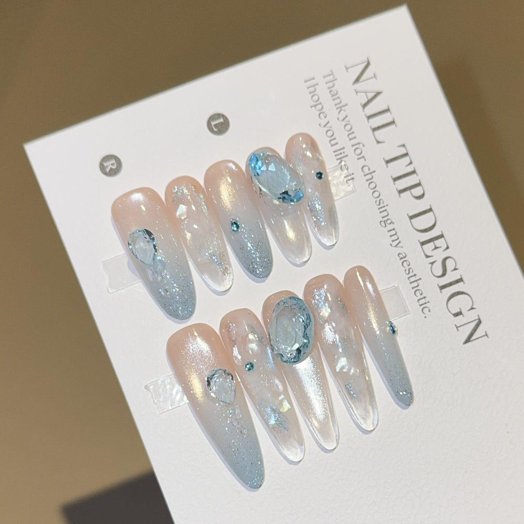 Artificial nails with rhinestones and glitter effects Stornfield